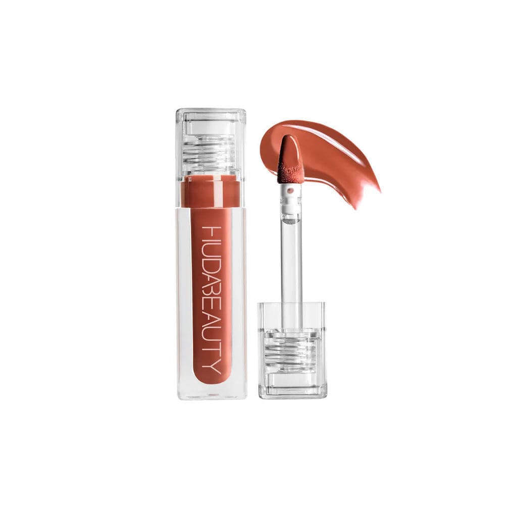 Buy Original Huda Beauty FAUX FILLER Extra Shine Lip Gloss Foxy - Online at Best Price in Pakistan Buy Original Huda Beauty FAUX FILLER Extra Shine Lip Gloss Foxy - Online at Best Price in Pakistan